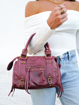 Borsa con fibbie in pelle opaca bordeaux