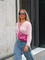 Pullover con zip in pelliccia rosa