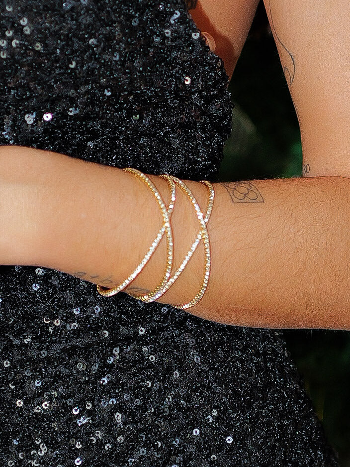 Bracciale incrociato con brillanti dorati