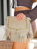 Borsa beige con borchie a frange