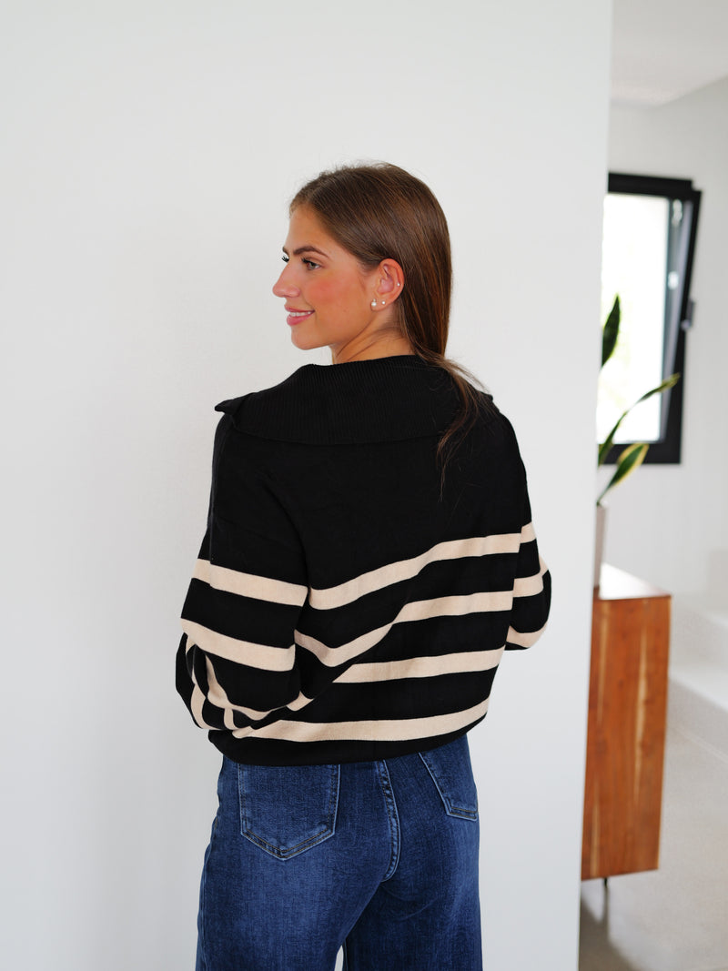 Pullover con zip a righe nere