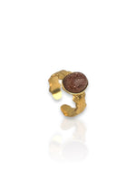 Anello ovale marrone con glitter