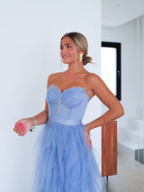 Abito corsetto con volant in pizzo blu