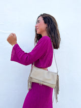 Borsa in pelle con catene sfrangiate color crema